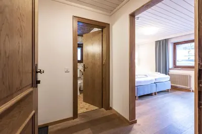 Ein Bett oder Betten in einem Zimmer der Unterkunft Hotel Pinzgauerhof - Inclusive Evening Dinner