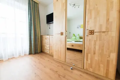 Ein Bett oder Betten in einem Zimmer der Unterkunft Apart Steiner