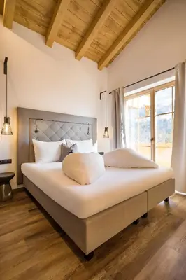 Ein Bett oder Betten in einem Zimmer der Unterkunft Das Krumerhaus