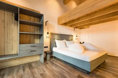 Ein Bett oder Betten in einem Zimmer der Unterkunft Das Krumerhaus