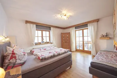 Ein Bett oder Betten in einem Zimmer der Unterkunft Haus Moosmann am Sonnenplatz