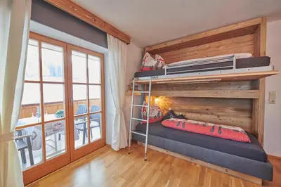 Ein Bett oder Betten in einem Zimmer der Unterkunft Haus Moosmann am Sonnenplatz
