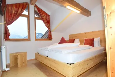 Ein Bett oder Betten in einem Zimmer der Unterkunft Haus Salvenmoser