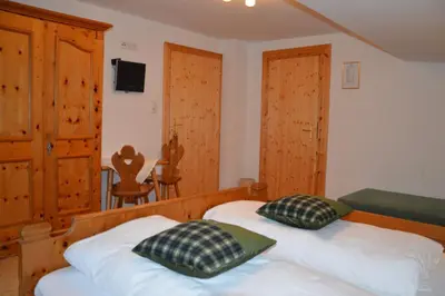Ein Bett oder Betten in einem Zimmer der Unterkunft Haus Salvenmoser