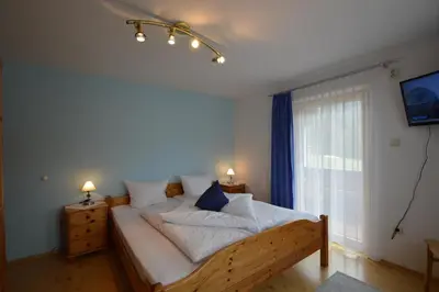 Ein Bett oder Betten in einem Zimmer der Unterkunft Haus Salvenmoser