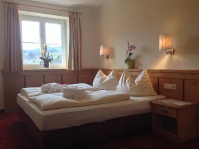 Ein Bett oder Betten in einem Zimmer der Unterkunft Hotel Gasthof Schweizerhaus