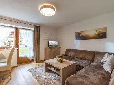 Ein Sitzbereich in der Unterkunft Gästehaus Schwaiger - Wiesenweg
