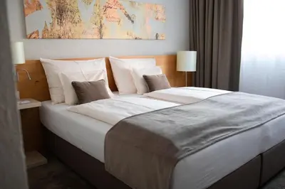 Ein Bett oder Betten in einem Zimmer der Unterkunft Hotel Zirbenhof