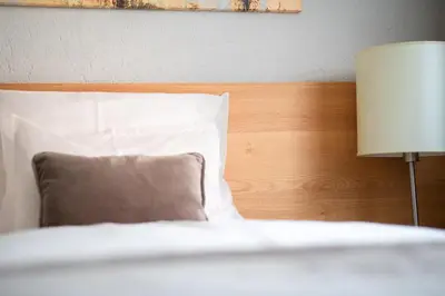 Ein Bett oder Betten in einem Zimmer der Unterkunft Hotel Zirbenhof