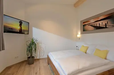 Ein Bett oder Betten in einem Zimmer der Unterkunft Appartement Beate