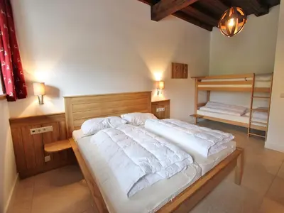 Ein Bett oder Betten in einem Zimmer der Unterkunft Heritage Chalet in Niedernsill near Ski Area