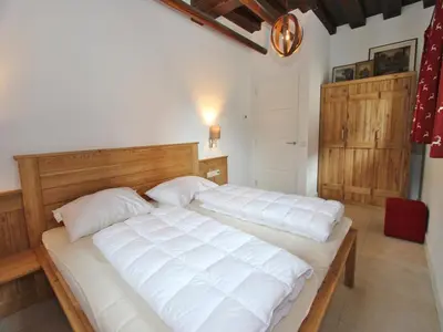 Ein Bett oder Betten in einem Zimmer der Unterkunft Heritage Chalet in Niedernsill near Ski Area