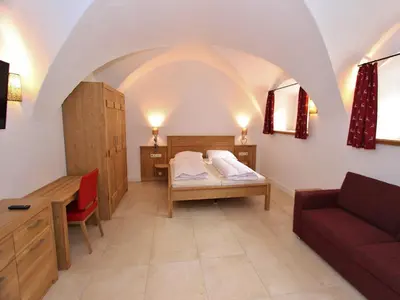 Ein Bett oder Betten in einem Zimmer der Unterkunft Heritage Chalet in Niedernsill near Ski Area