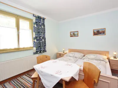 Ein Bett oder Betten in einem Zimmer der Unterkunft Apartment Neukirchen near Ski Slopes