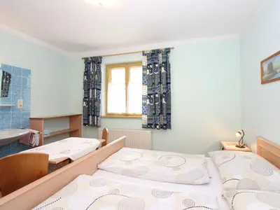 Ein Bett oder Betten in einem Zimmer der Unterkunft Apartment Neukirchen near Ski Slopes