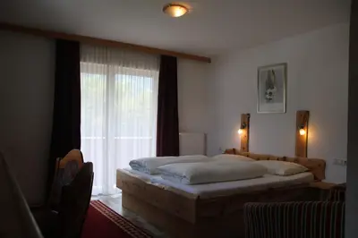 Ein Bett oder Betten in einem Zimmer der Unterkunft Gasthof zum Löwen