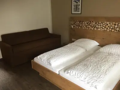 Ein Bett oder Betten in einem Zimmer der Unterkunft Pension Appartments Christoph