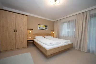 Ein Bett oder Betten in einem Zimmer der Unterkunft Pension Appartments Christoph