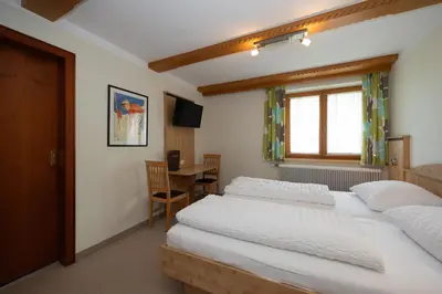 Ein Bett oder Betten in einem Zimmer der Unterkunft Pension Appartments Christoph