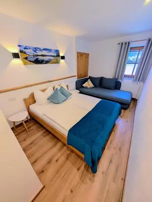 Ein Bett oder Betten in einem Zimmer der Unterkunft Haus Dirol