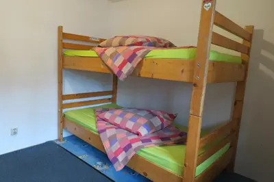 Ein Etagenbett oder Etagenbetten in einem Zimmer der Unterkunft SnowBunnys BackPackers Hostel