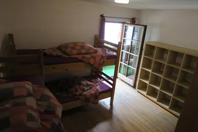 Ein Bett oder Betten in einem Zimmer der Unterkunft SnowBunnys BackPackers Hostel