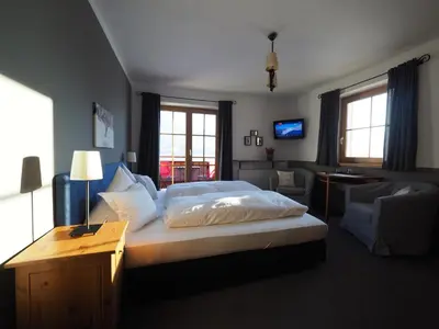 Ein Bett oder Betten in einem Zimmer der Unterkunft Pension Hinterseer