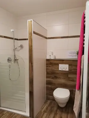 Ein Badezimmer in der Unterkunft BERGHEIL Apartments