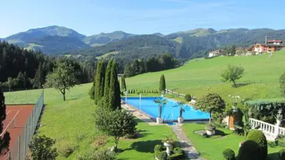 Der Swimmingpool an oder in der Nähe von Gartenhotel Lenzenhof - Wildschönau- PREMIUMCARD inclusive