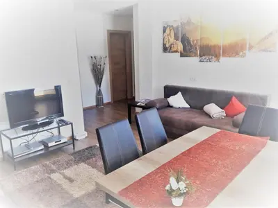 Ein Sitzbereich in der Unterkunft Panorama Apartment