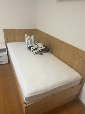 Ein Bett oder Betten in einem Zimmer der Unterkunft Ferienwohnung Eberharter Theresia