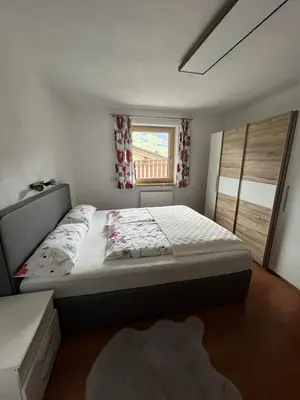 Ein Bett oder Betten in einem Zimmer der Unterkunft Ferienwohnung Eberharter Theresia