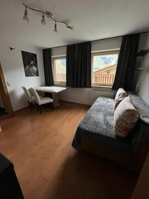 Ein Bett oder Betten in einem Zimmer der Unterkunft Ferienwohnung Eberharter Theresia