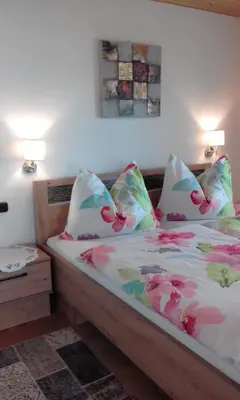 Ein Bett oder Betten in einem Zimmer der Unterkunft Ferienwohnungen Fahringer Diana