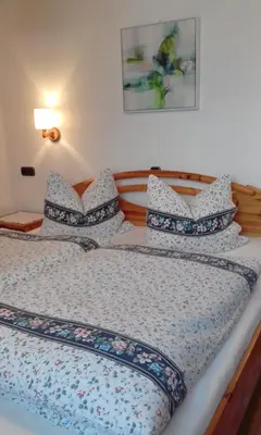 Ein Bett oder Betten in einem Zimmer der Unterkunft Ferienwohnungen Fahringer Diana