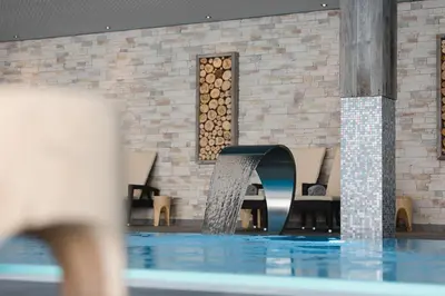 Der Swimmingpool an oder in der Nähe von Wildkogel Resorts - DAS Bramberg