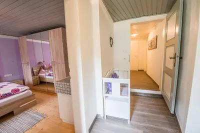 Ein Bett oder Betten in einem Zimmer der Unterkunft Ferienwohnung Wald