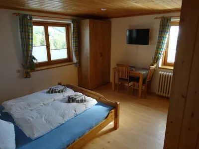 Ein Bett oder Betten in einem Zimmer der Unterkunft Gästehaus Posch
