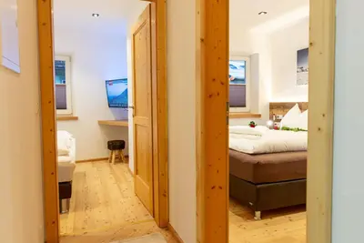 Ein Bett oder Betten in einem Zimmer der Unterkunft Appartements Ski Rent Michael