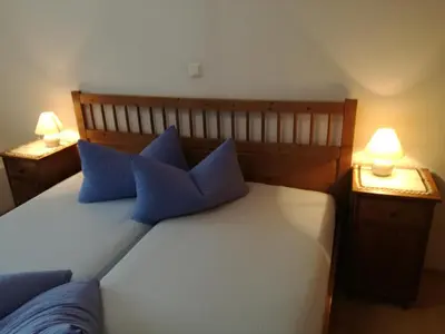Ein Bett oder Betten in einem Zimmer der Unterkunft Ferienwohnung Himler