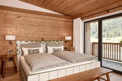 Ein Bett oder Betten in einem Zimmer der Unterkunft Kitzbühel Lodge