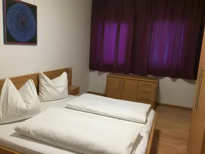 Ein Bett oder Betten in einem Zimmer der Unterkunft Appartement Feinsinn