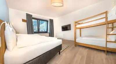 Ein Bett oder Betten in einem Zimmer der Unterkunft Kristall Plaza