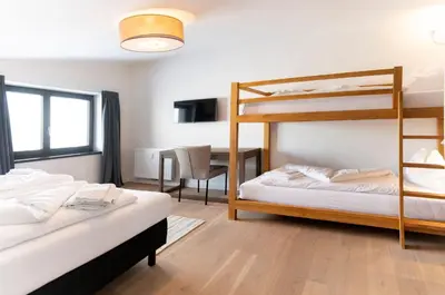 Ein Bett oder Betten in einem Zimmer der Unterkunft Kristall Plaza