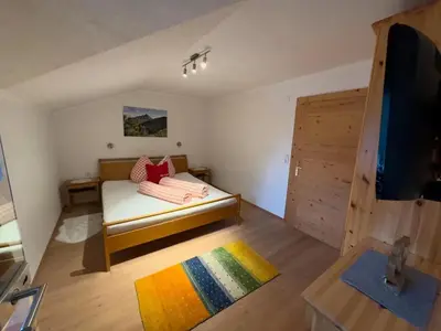 Ein Bett oder Betten in einem Zimmer der Unterkunft Apart Eberharter