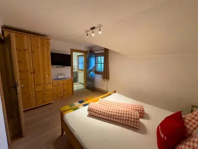 Ein Bett oder Betten in einem Zimmer der Unterkunft Apart Eberharter