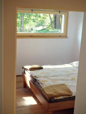 Ein Bett oder Betten in einem Zimmer der Unterkunft Modernes Chalet mit Terrasse und Parkplatz in den Alpen