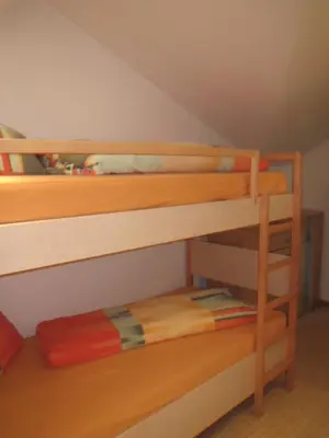 Ein Bett oder Betten in einem Zimmer der Unterkunft Ascherhof