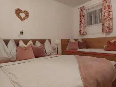 Ein Bett oder Betten in einem Zimmer der Unterkunft Apart Jakob