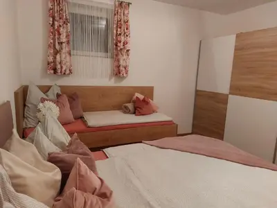Ein Bett oder Betten in einem Zimmer der Unterkunft Apart Jakob